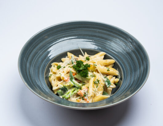 Creamy vegetable penne pasta, a delicious and hearty meal.