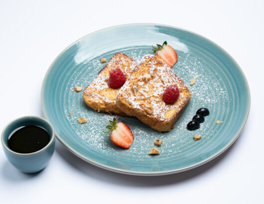 A mouthwatering plate of French toast, perfect for a weekend brunch.