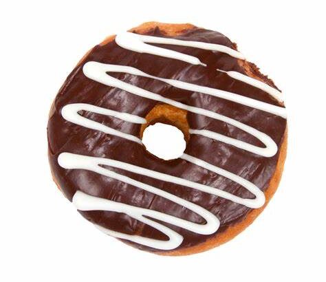 A chocolate glazed donut with white chocolate drizzle on top, isolated on a white background.