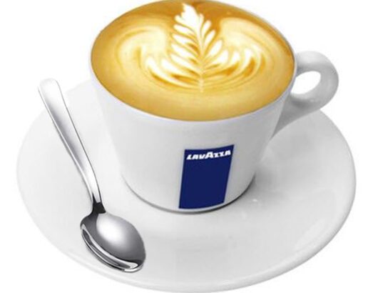 Lavazza coffee with latte art, served on a saucer.